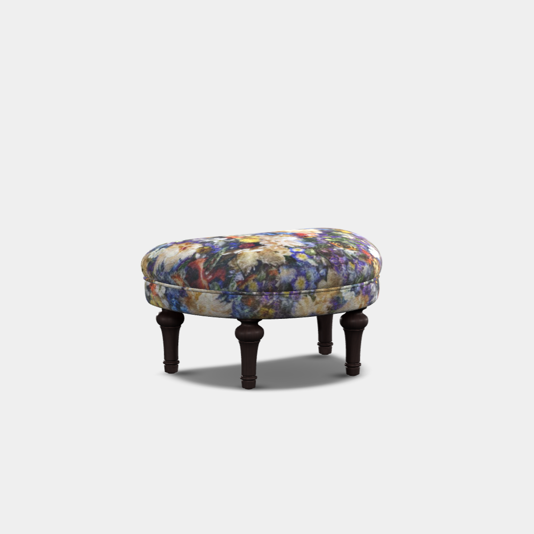 half moon shape foot stool with patterned fabric and turned feet