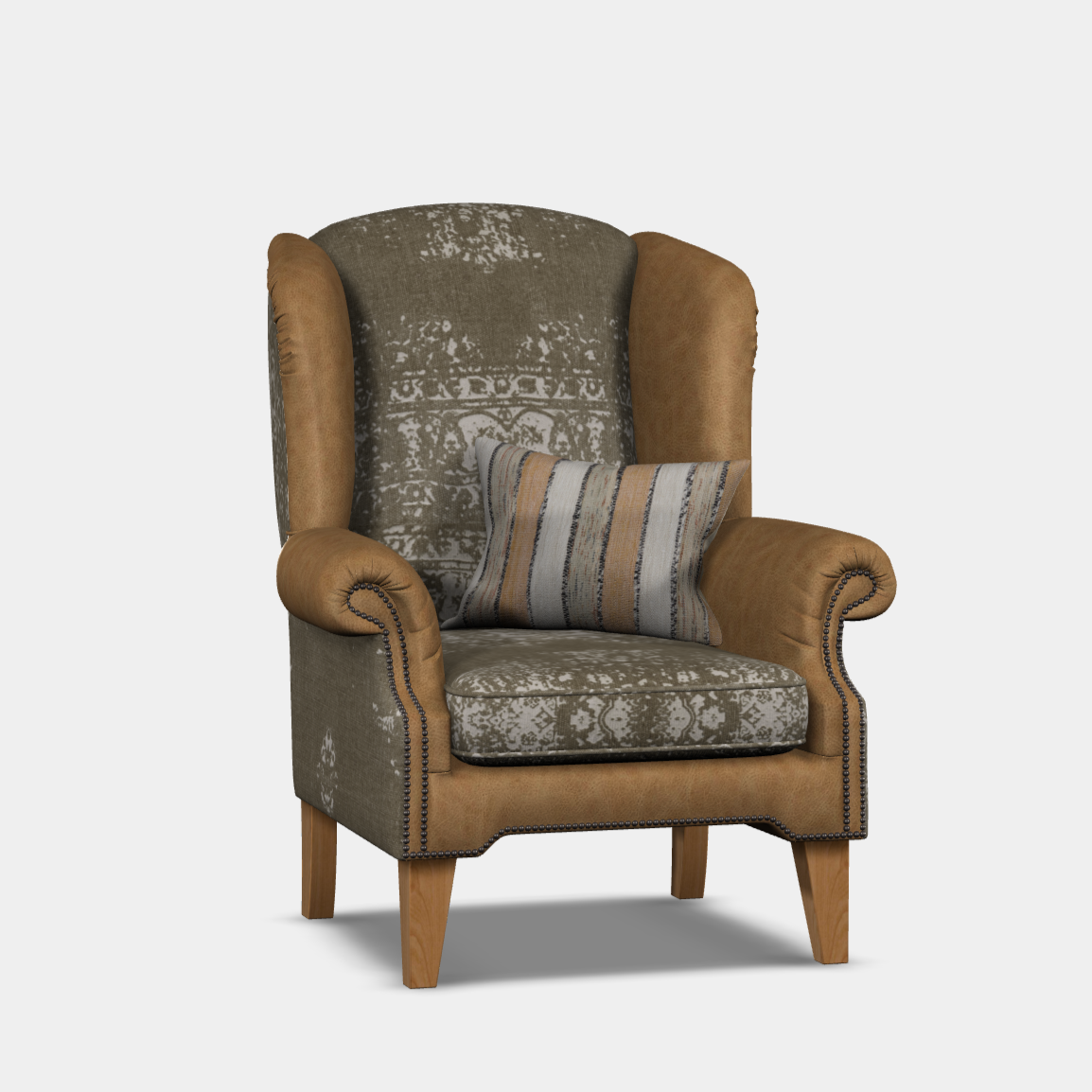 A traditional wing chair with a shaped front edge, featuring a patterned fabric, feather seat cushions, hand studded arms, and a wooden frame.