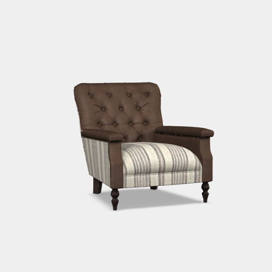 A brown Chesterfield inspired chair with a modern, contemporary twist featuring a fully sprung seat and back, foam filled seat cushions, and slender arms with hand studded detail.