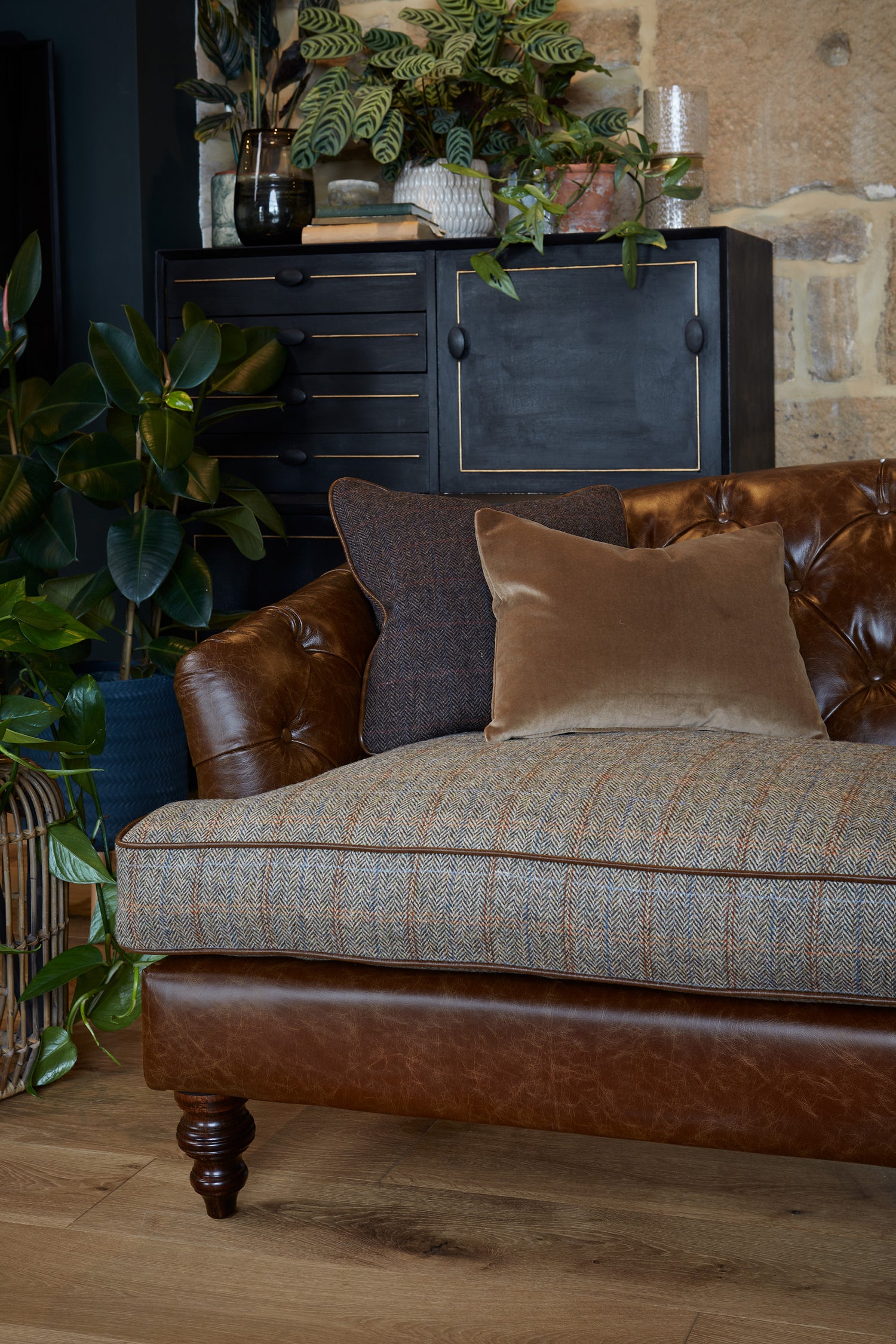 Tetrad Dalmore in Leather / Harris Tweed mix.  Deep buttoned by hand.